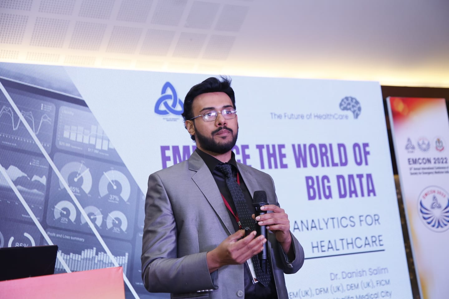Dr. Danish Salim speaking at a conference